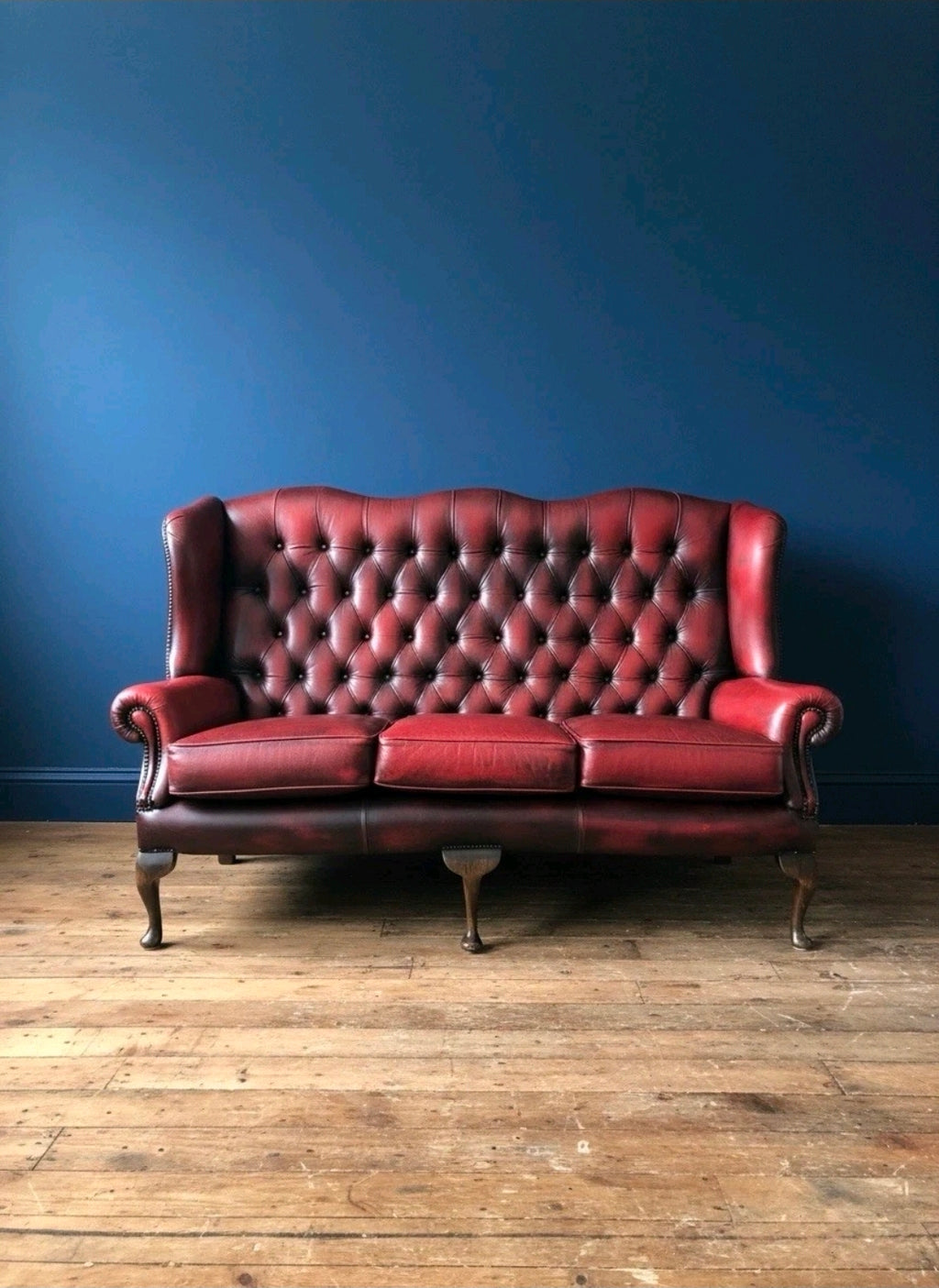 Vintage Oxblood Leather Chesterfield 3 seater Wingback Sofa.