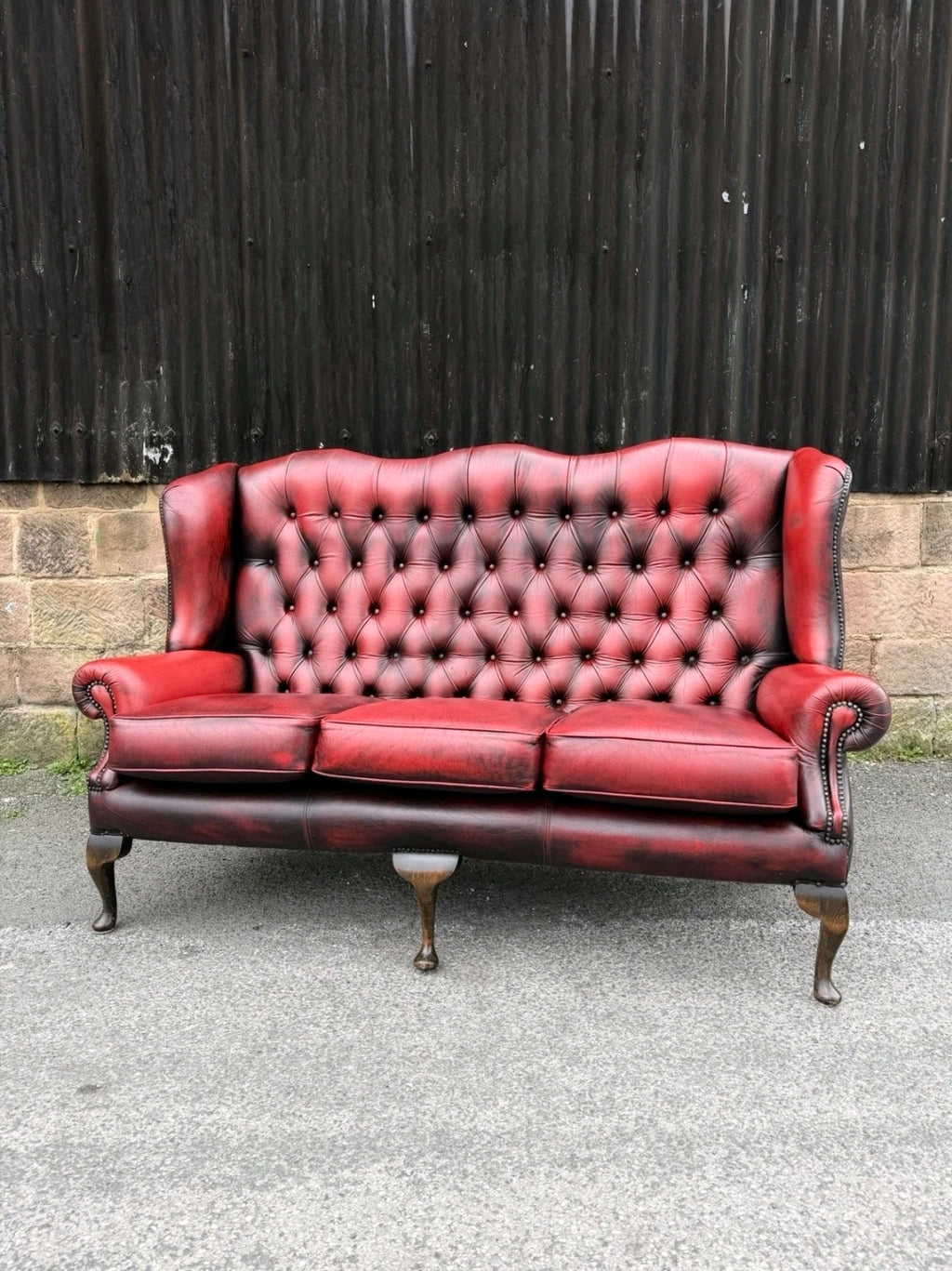 Vintage Oxblood Leather Chesterfield 3 seater Wingback Sofa.